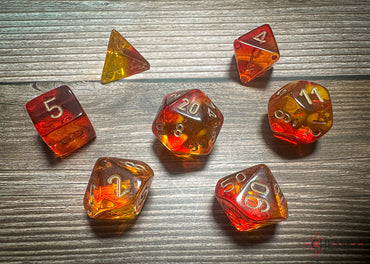 Gemini Translucent Red-Yellow/gold Polyhedral 7-Dice Set